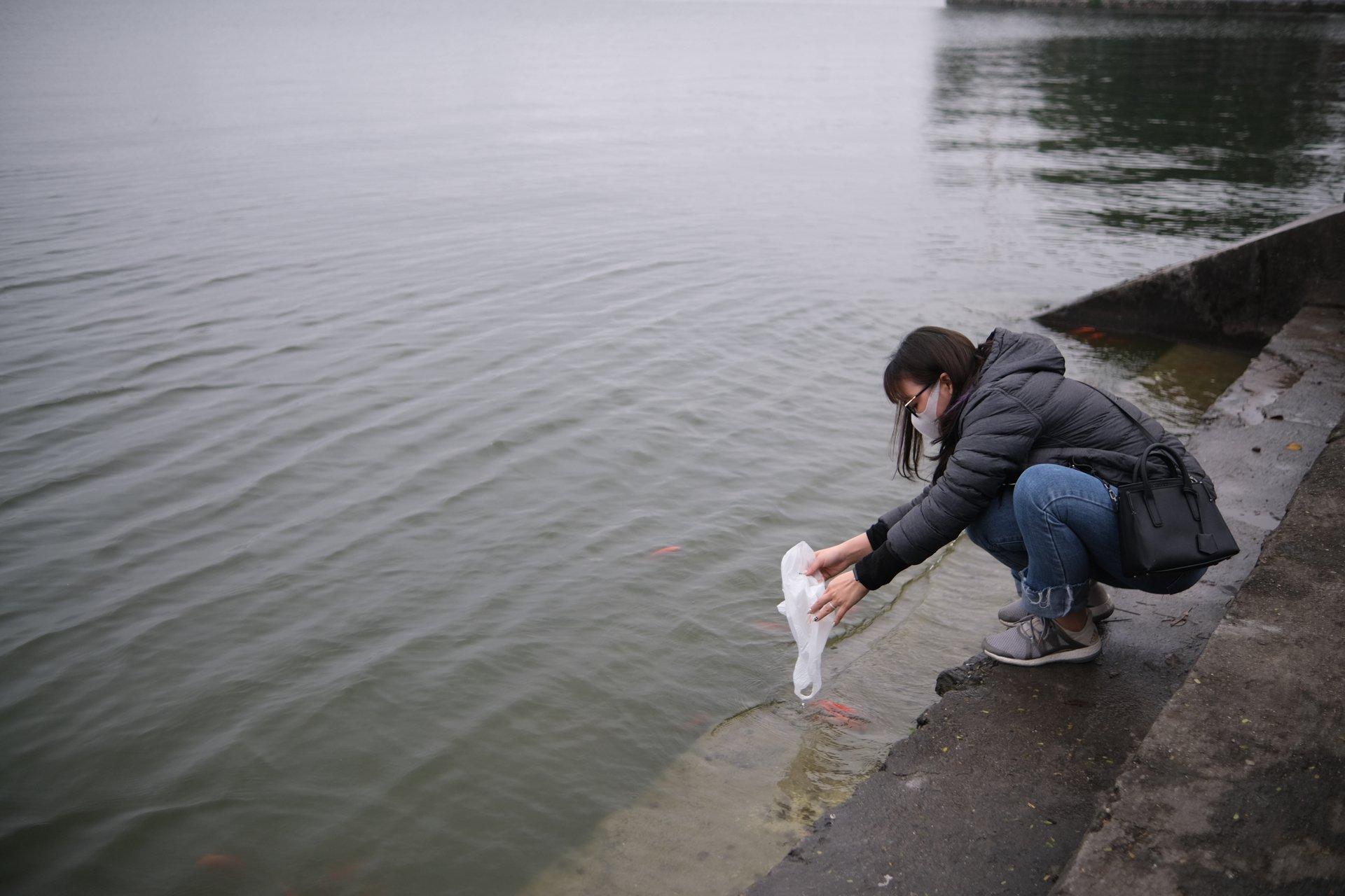 tha ca tien ong Tao truoc gio di lam anh 7