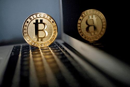 Ảnh minh họa về tiền điện tử được chụp tại La Maison du Bitcoin ở Paris - Pháp tháng 6-2022 Ảnh: REUTERS.